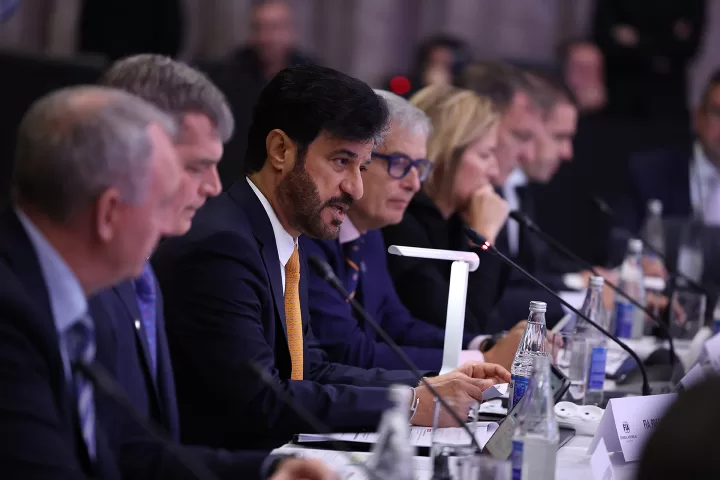 FIA President speaking whilst wearing an orange tie