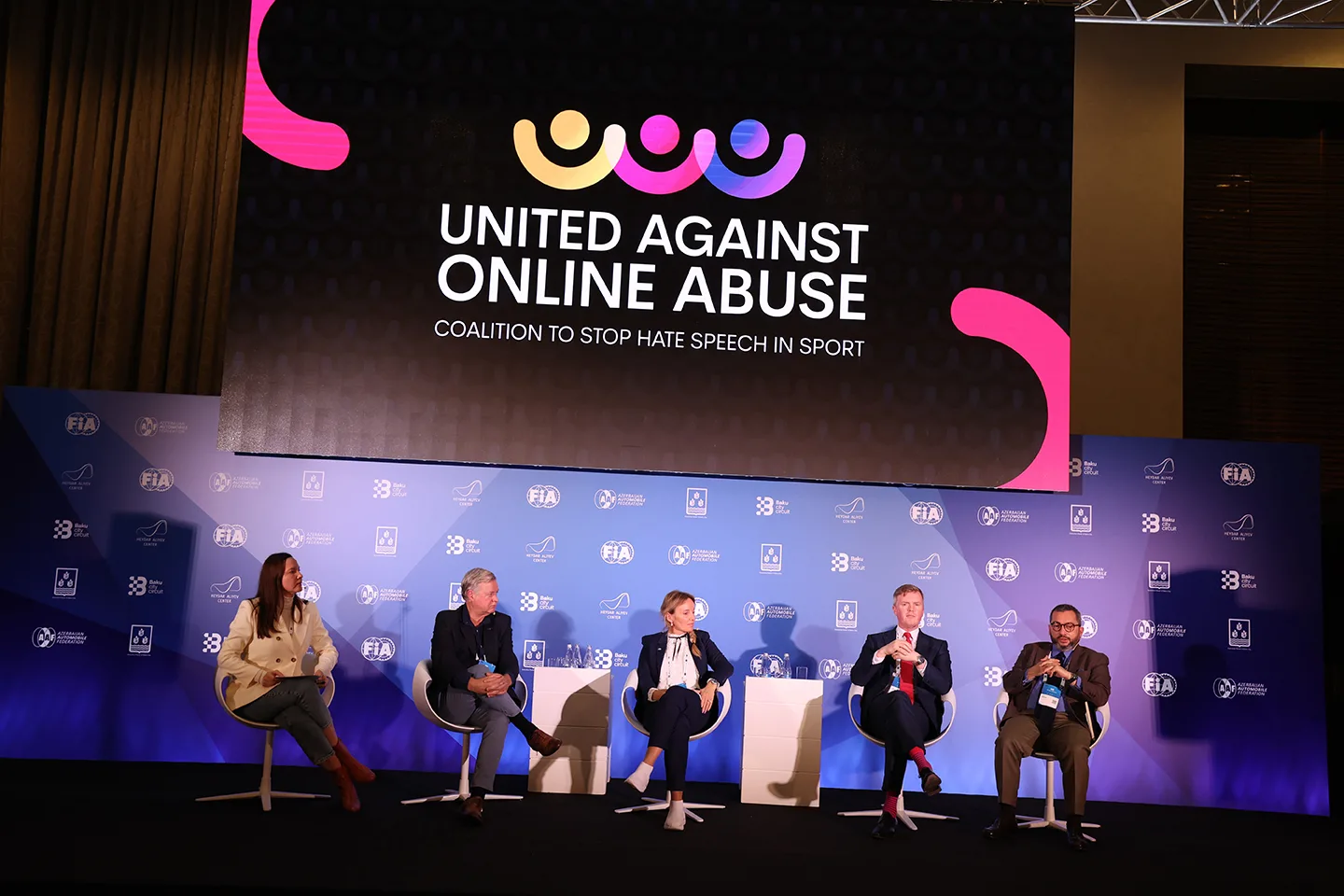 Panel of five discussing online abuse