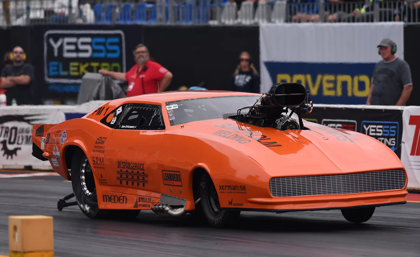 Bright orange drag racing car