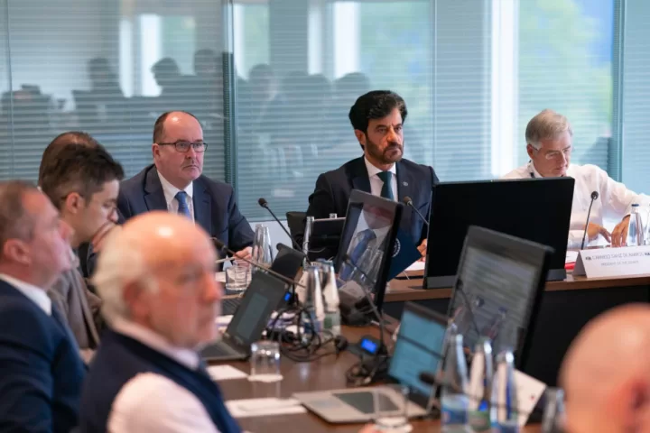 FIA President sat at the head of a table surrounded on either side by other conference attendees