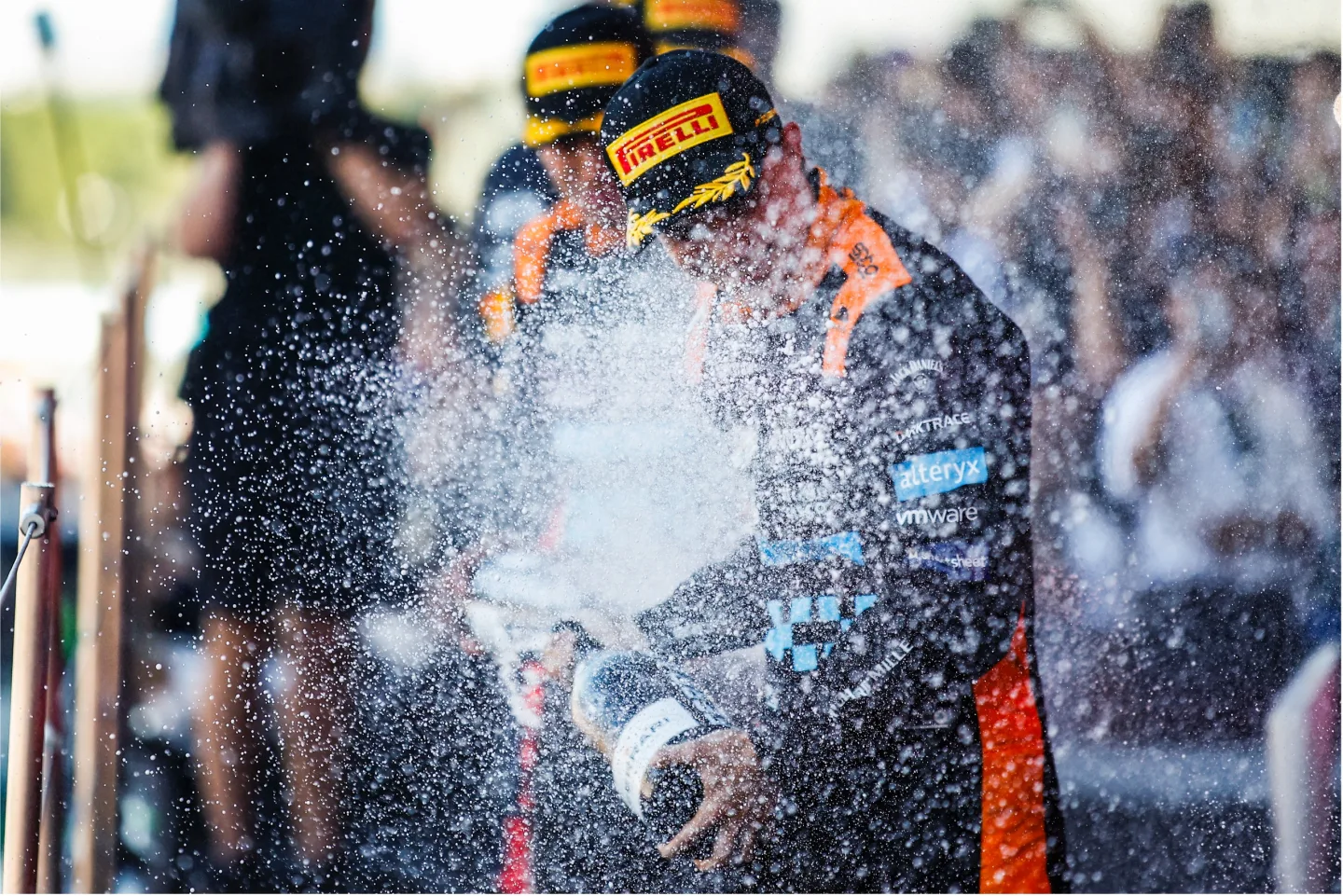 F1 driver sprays champagne after race